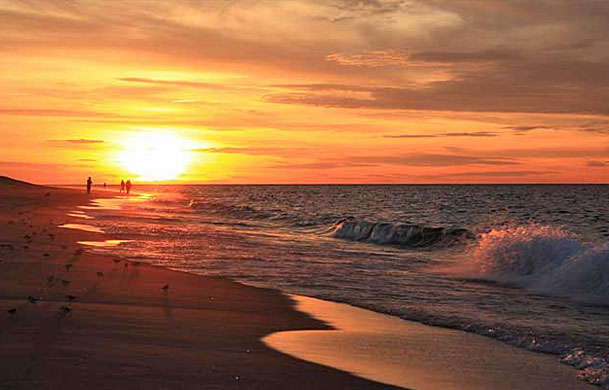 Sunset over Cape Cod beach near Adventure Bound resort